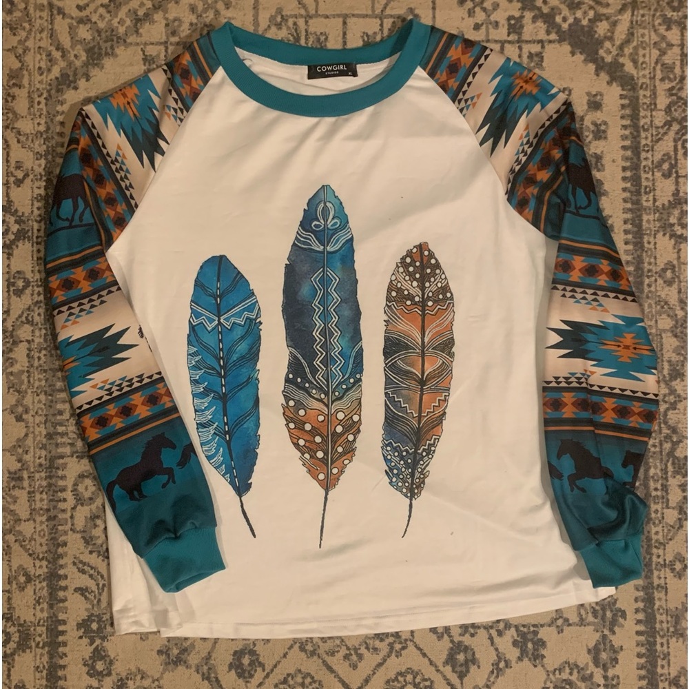 Very nice western west tee shirt. Long sleeves women sz. XL. Made by COWGIRL.